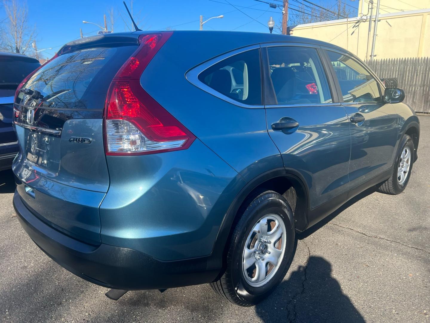 2013 Teal /Gray Honda CR-V LX 4WD 5 Speed AT (5J6RM4H33DL) with an 2.4L L4 DOHC 16V engine, 5 Speed Automatic transmission, located at 1018 Brunswick Ave, Trenton, NJ, 08638, (609) 989-0900, 40.240086, -74.748085 - Photo#2